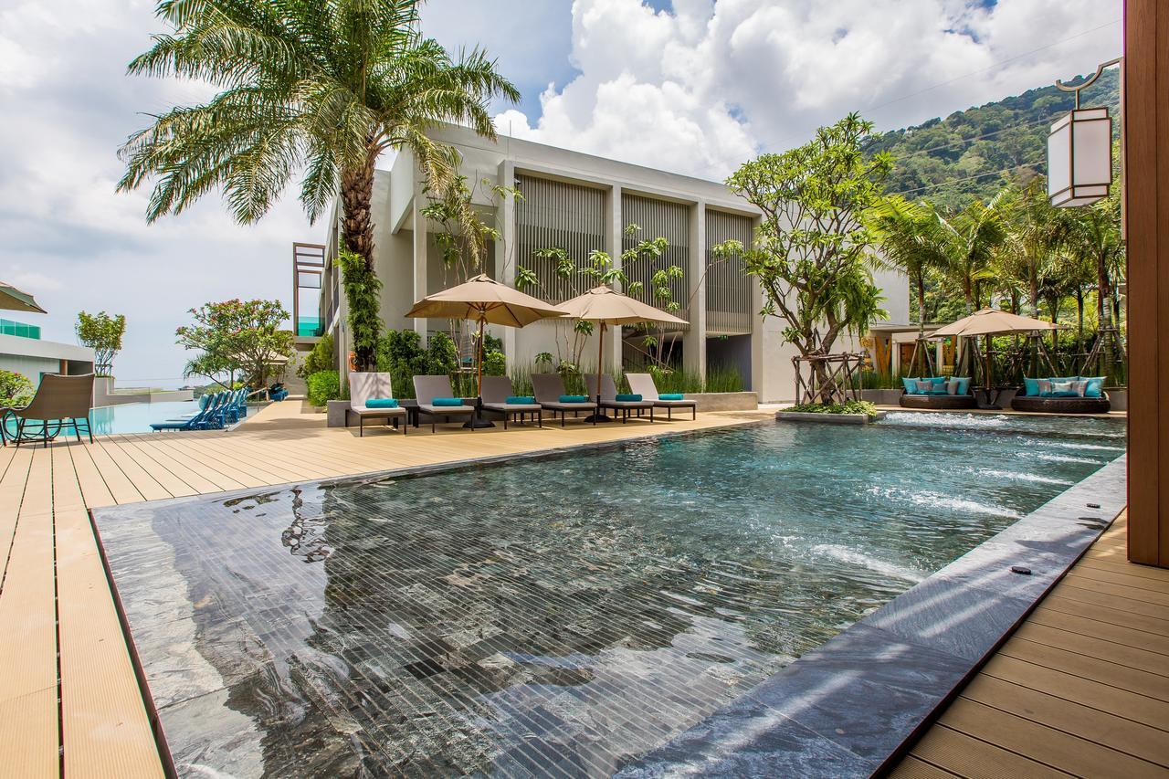 Fusion Suites Phuket Patong Eksteriør bilde The swimming pool at the hotel