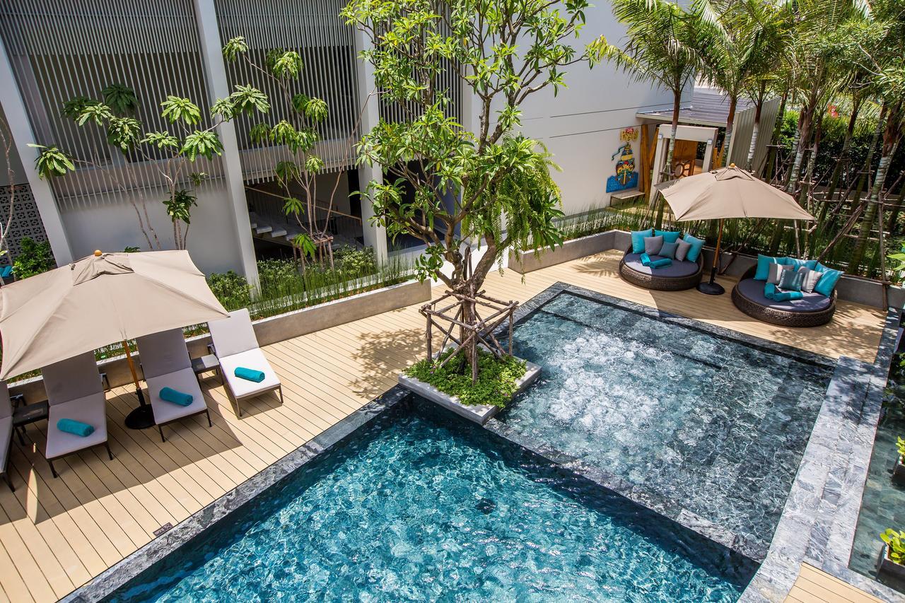 Fusion Suites Phuket Patong Eksteriør bilde The swimming pool at the hotel