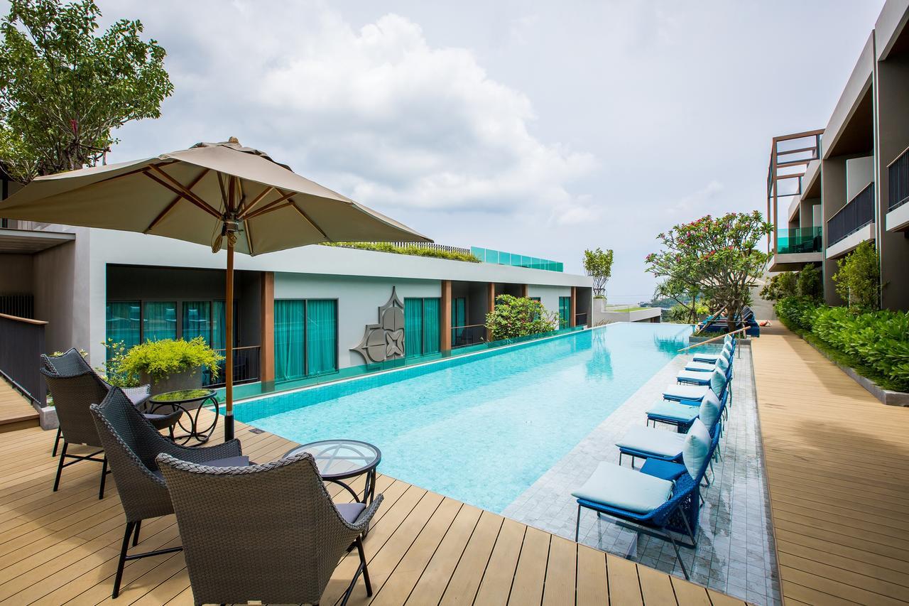Fusion Suites Phuket Patong Eksteriør bilde The swimming pool at the hotel